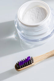 אבקה להלבנת שיניים